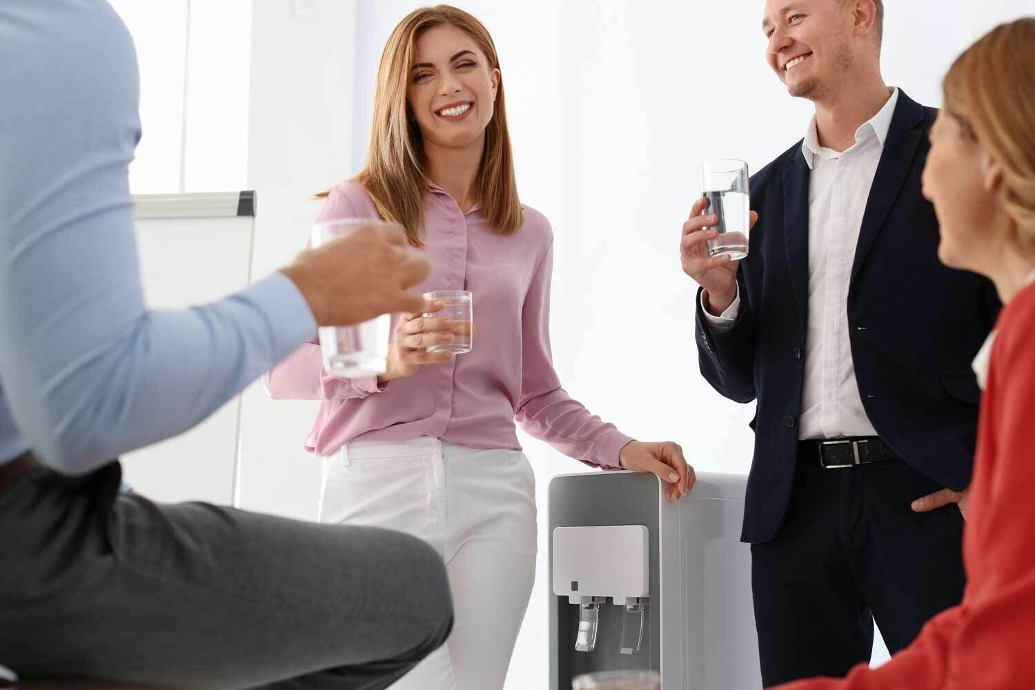 Employees at a water cooler